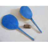 A Silver Backed Hand Mirror, brush, napkin ring and guilloch‚ enamel mirror and brush