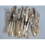 Silver Plated and mother of pearl handled fruit knives and forks