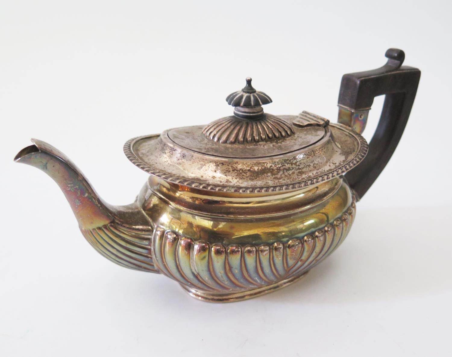 A Victorian Silver Teapot with ebony handle, Birmingham 1898, George Unite, 400g gross