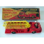 Plastic Toy _ A Marx NYCFD Mechanical Fire Truck with automatic flashing light and siren, 33cm