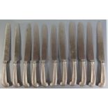 Set of 11 Georgian silver pistol handled knives with crests