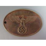 A WWII German Police Identity Disc, 'GEHEIME STAATSPOLIZEI 616'