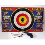 Tin Plate Toy _ A Marx Gang Busters Trap Door Target. Manufactured in 1940 and complete with stands,