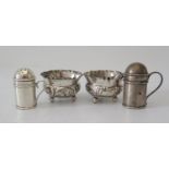 A Pair of Edward VII Silver Embossed Salts, Birmingham 1983 and two silver treasure style pepper