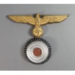 A German WWII Kriegsmarine Cap Eagle (top pin missing)