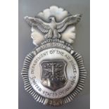 A US Airforce Air Police Badge, Cold War period c. 1965, engraved F8920