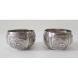 A Pair of Indian Silver Salts decorated with animals and birds 52 grams