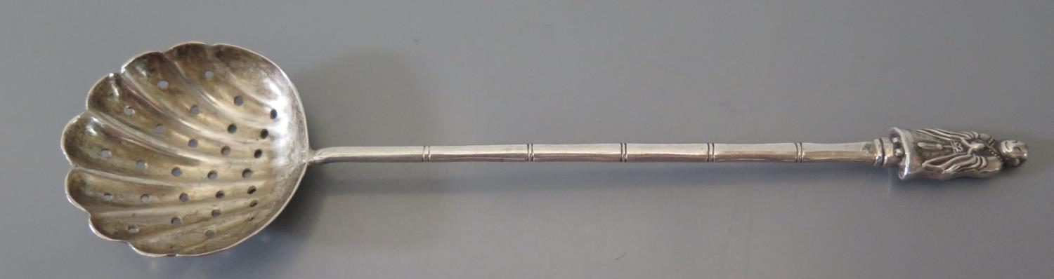 A Chinese Silver Sugar Sifting Spoon, marks rubbed, 19g