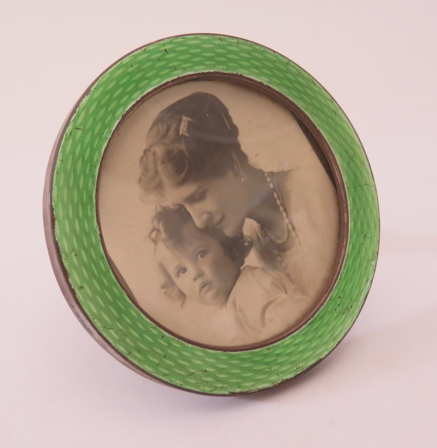 A George V Silver and Guilloché Enamel Circular Photograph Frame, 3 1/4in., Birmingham 1912, Henry