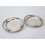 A Pair of Georg Jensen Silver Pin Dishes with floral decoration, marked 428A, 10cm diam., 101g