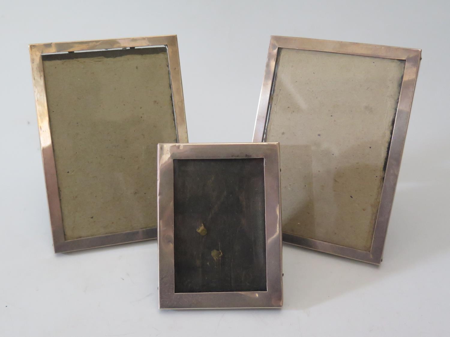 A Pair of George V Silver Photograph Frames, 5. 5 by 3. 5 inch aperture, London 1919 and 1 other