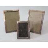 A Pair of George V Silver Photograph Frames, 5. 5 by 3. 5 inch aperture, London 1919 and 1 other