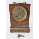 An Early Nineteenth Century Striking Mantle Clock by Henri a Paris, in a rosewood and marquetry