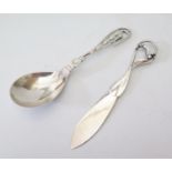 A Georg Jensen Silver Butter Knife marked GI 122 London 1927 import marks 26g and spoon marked 42