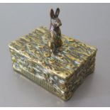 A Brass Vesta with hinged top and rabbit finial, 19th century, 5 x 3.5cm base