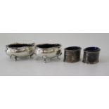 Two Pairs of Silver Salts with blue glass liners London 1908 and 1910 and the other Birmingham 1922