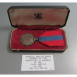 Imperial Service Medal (boxed) and Lusitania medal (boxed with propaganda print) and Queen's