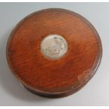 A Circular Oak Box made from HMS Royal George (1756) which sank off Portsmouth 1782. Inset with