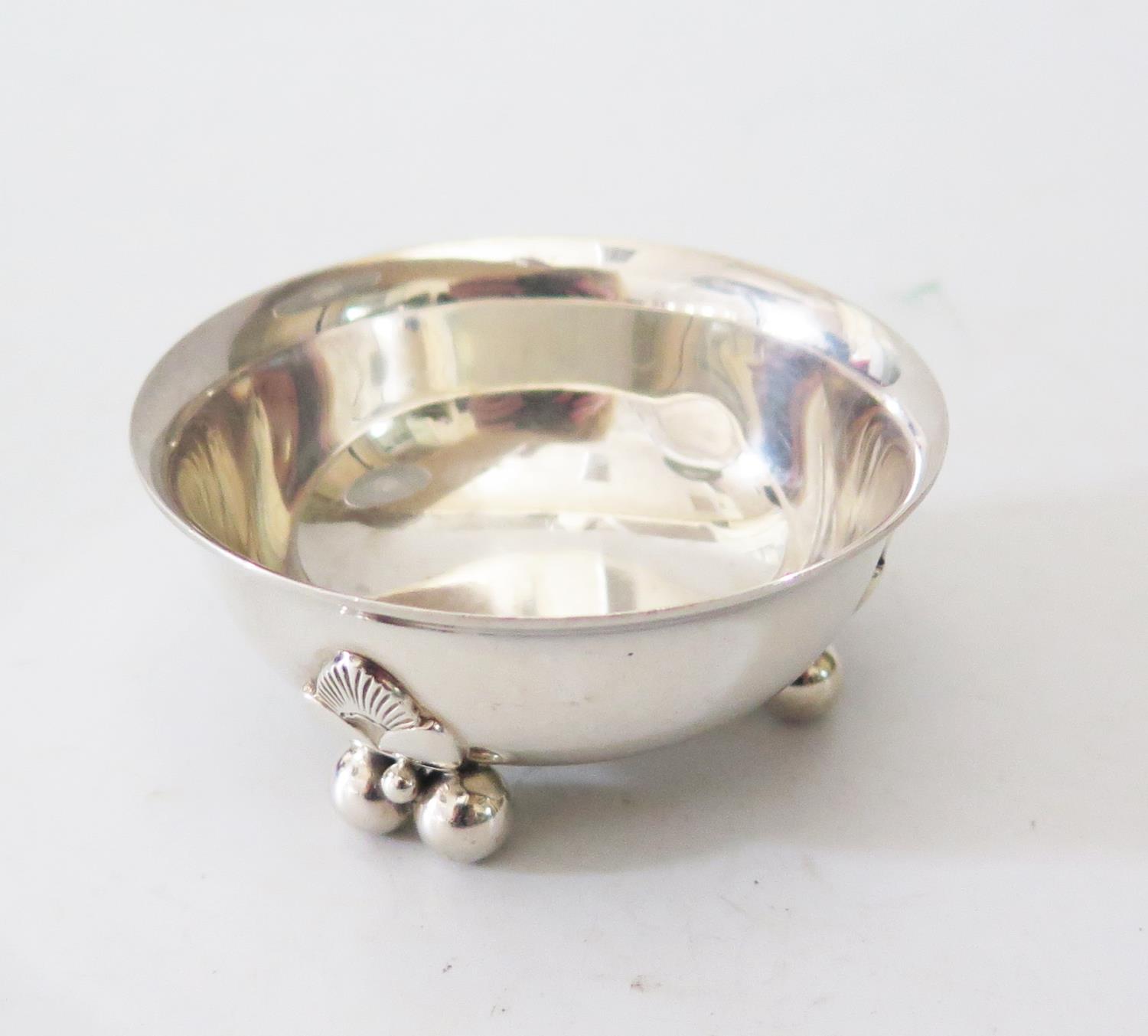 A Georg Jensen Silver Salt, marked 646A, 58g, London 1955 import marks, 6.5cm diam.