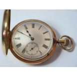 An 18ct Gold Half Hunter Keyless Pocket Watch with blue enamel chapter ring, the 41mm enamel dial