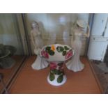 A damaged Wemyss vase and two figurines