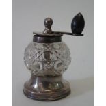 A Victorian silver and cut glass pepper grinder, London 1898