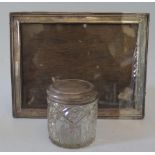 A silver topped dressing table pot and photograph frame