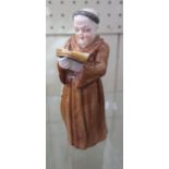 2 Royal Worcester candle extinguishers, lady with bonnet and monk