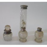 3 silver collared dressing table bottles and one other