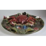 A Palissy Ware Plate decorated with crab and other seafood, 32cm