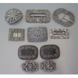 A selection of cut steel buckles and others