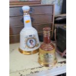 A Bells Queen 60th birthday commemorative bottle of whisky and one other