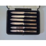 A cased set of silver handled tea knives