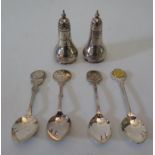 A pair of Sheffield silver peppers and electroplated silver bowling spoons