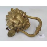 A 19th Century gilt lion mask door knocker