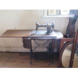 Treadle sewing machine, nest of tables, stool and mirror