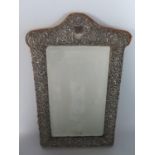 An Edward VII Silver Framed Easel Back Dressing Table Mirror with embossed foliate scroll