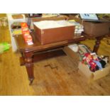 A Victorian Mahogany Wind Out Dining Table with single leaf and fluted legs with brass castors