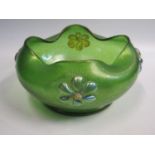 A Loetz Style Iridescent Glass Shaped Bowl with applied flowers, 25cm diam.