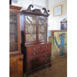 A 19th Century Mahogany Glazed Bookcase with chest below