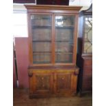 A Victorian Mahogany Glazed Dresser with cupboard below