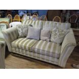 A Pair of Laura Ashley Two Seater Sofas