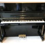 Irmler (c2007) A Model 122 upright piano in a traditional bright ebonised case.