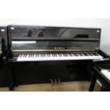 Kawai (c2012) A Model K-15 upright piano in a bright ebonised case.