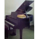 Blüthner (c1974) A 5ft 5in Model 10 grand piano in a bright ebonised case on square tapered legs.
