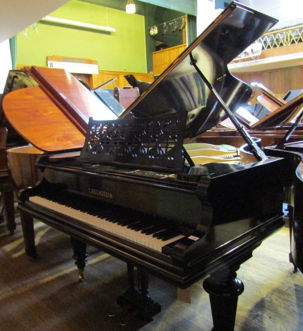 Bechstein (c1909) A 6ft 7in Model V grand piano in an ebonised case on turned octagonal legs.