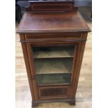 Music Cabinet An Edwardian mahogany and satinwood banded music cabinet enclosed by a glazed