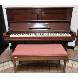 Steinway (c1884) A Model E upright piano in a rosewood case; together with a duet stool.