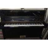 C Bechstein (c2000) A Model 116 upright piano in a bright ebonised case.