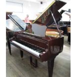 Schimmel (c1969|) A 5ft 2in grand piano in a bright mahogany case on square tapered legs.